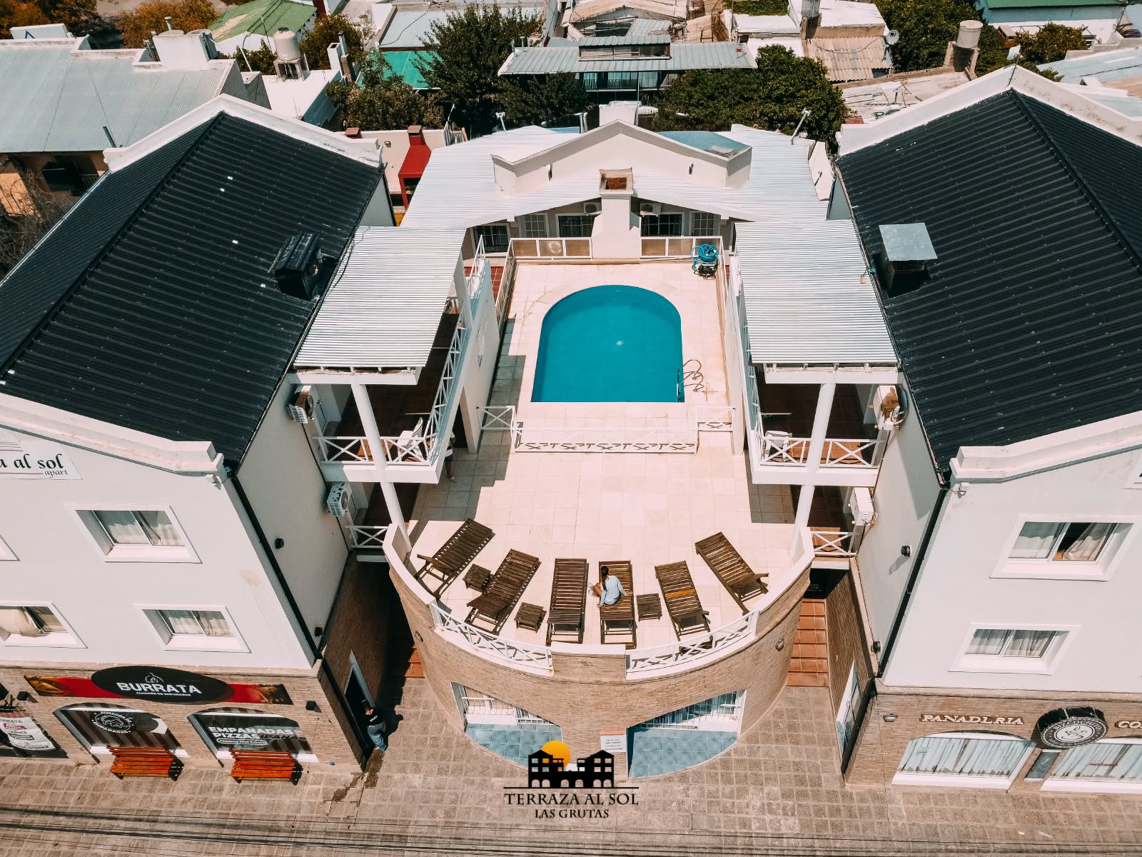 Aerial view of the complex and its pool